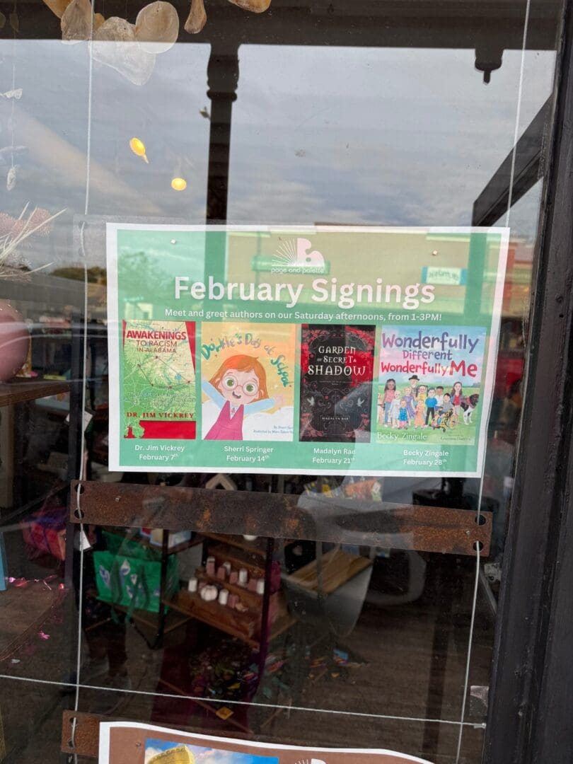 Bookstore window poster advertising February signings